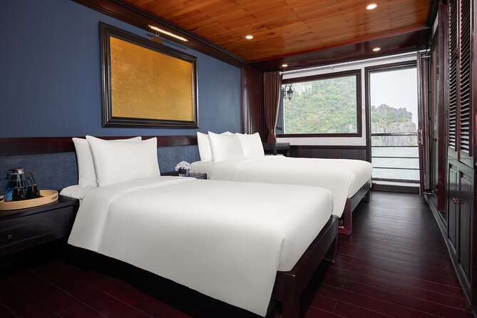2-Day Boutique Cruise Discover Hidden Gems of Bai Tu Long Bay - Sunset, dinner, and the night aboard
