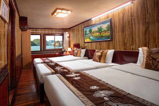 2-day Ha Long Bay Cruise included Transfer, Kayking and Swimming - Kayaking among the limestone islands
