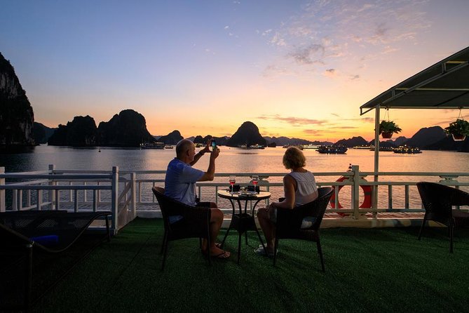 2-day Ha Long Bay Cruise included Transfer, Kayking and Swimming - Entering Ha Long Bay by cruise boat