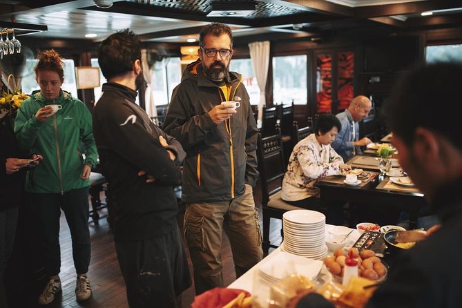 2-Day Halong Bay Overnight Cruise from Hanoi - Life onboard: meals, tai chi, and a cabin for the night