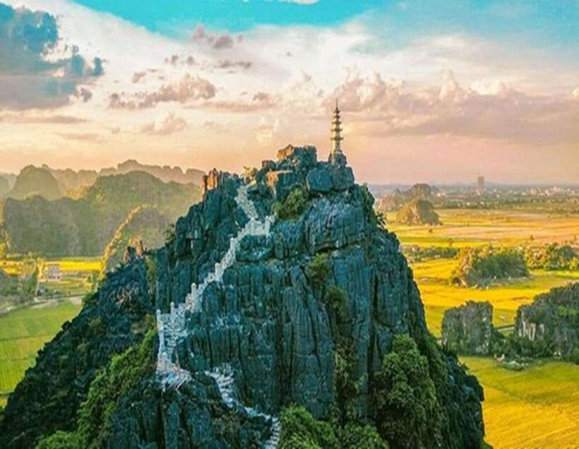 2-Day Ninh Binh Tour with Accommodation & Meals, Small Group - Bai Dinh Pagoda on an electric car