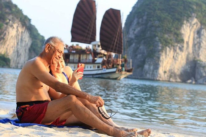 2-Day Spectacular Halong Bay Cruise from Hanoi - Boarding a traditional junk in the Gulf of Tonkin