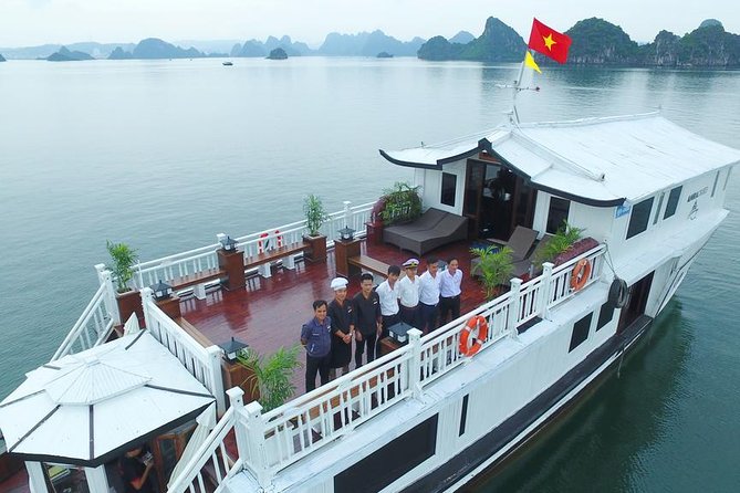 Bai Tu Long Bay Cruises Peaceful and Cozy Group Boat 2D1N - Spring rolls, fruit carving, and sunset drinks