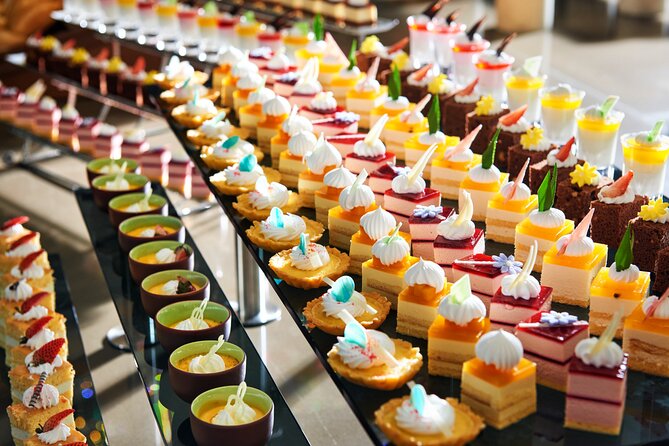 Buffet on Paradise Delight Dining Cruise Halong Bay Tour - Views from a ship built for shows