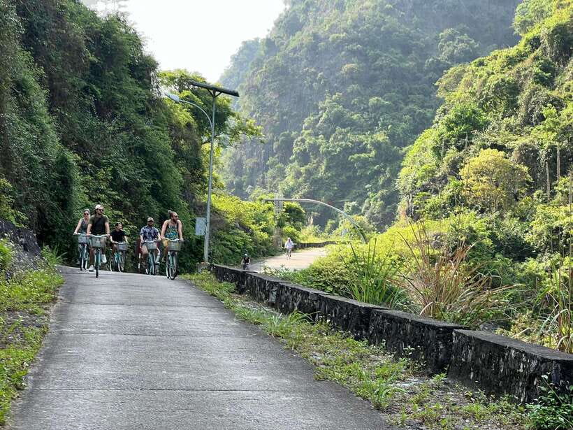 Cat Ba: Full- day trip with biking, kayaking, meal, tickets - Kayaking, bamboo boats, and the caves