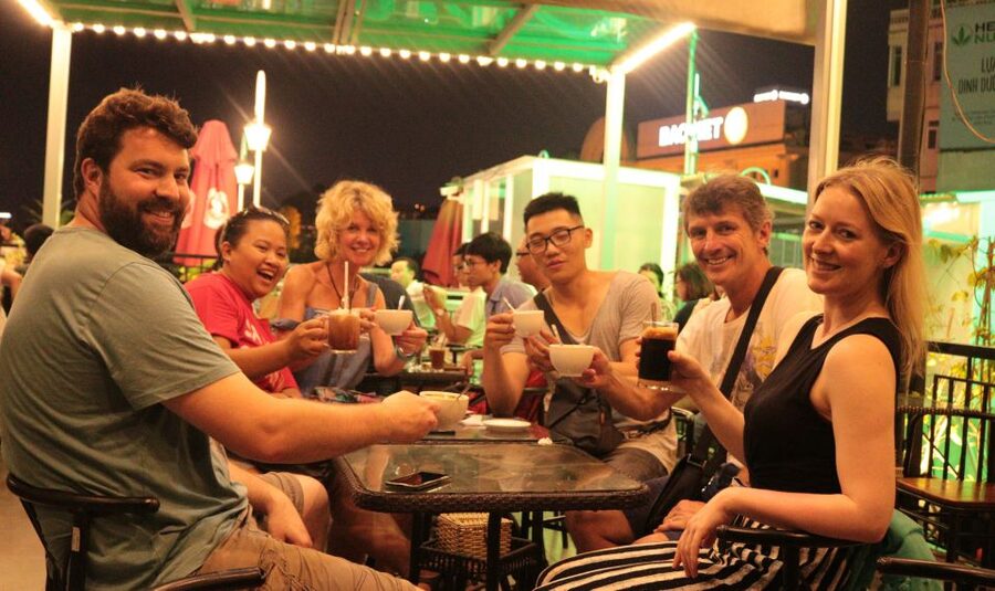 Discover Hanoi's Street Food by Night & Mini Class Coffee - From hotel pickup to the first Hanoi streets