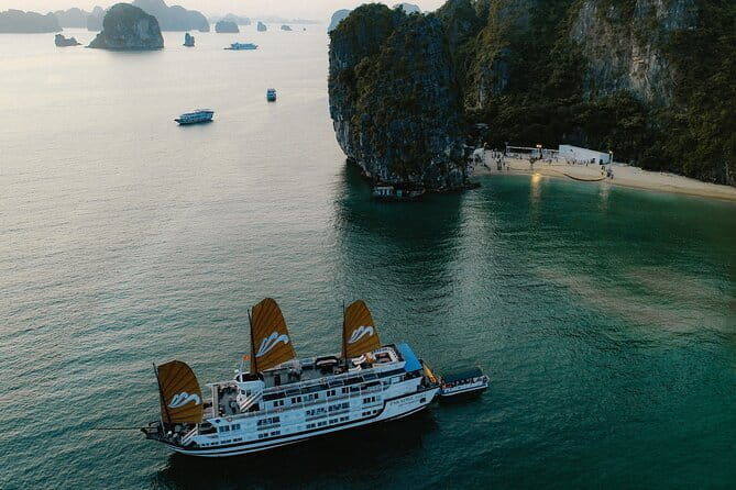 Emeraude Cruise 2 days 1 night Ha Long Bay Tour - Dinner, the standard cabin, and onboard evening time