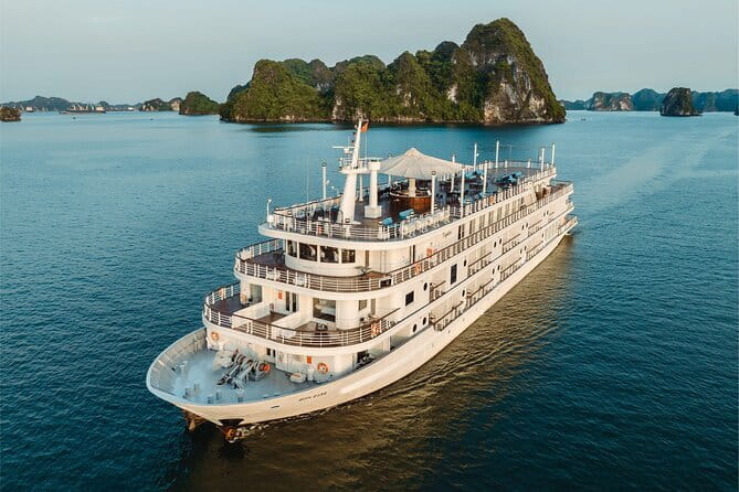 Emeraude Cruise 2 days 1 night Ha Long Bay Tour - Day 2: Coffee, yoga, and Sung Sot Cave