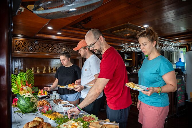 Explore Halong & Bai Tu Long Bay in 2 Days 1 Night from Hanoi - Dinner, sunset, and life on board