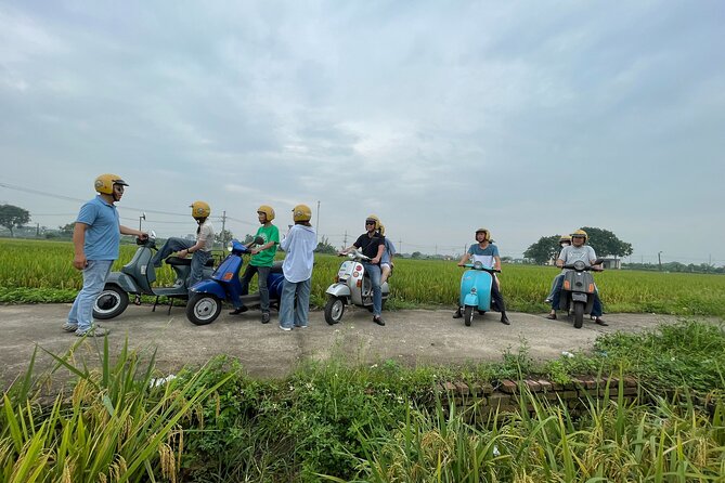 Exploring Vespa Tour Through Little Red River Delta - Crossing Long Bien Bridge