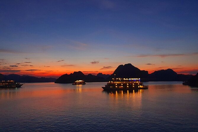 From Hanoi: 2-Day Luxury Halong Cruise Explore Caves & Island - Sunset, dinner, and an evening on the boat