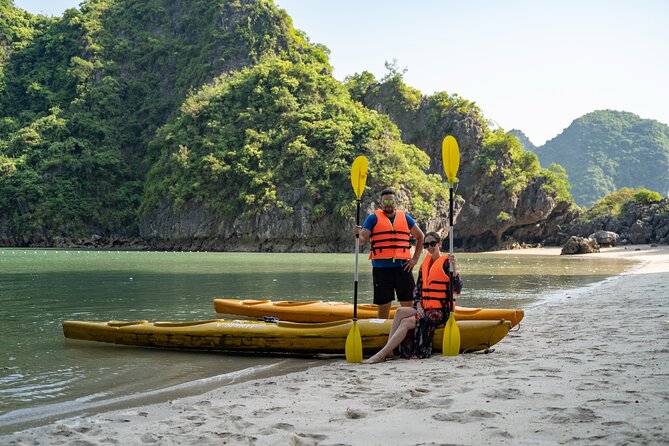 From Hanoi: 2D1N Ha Long Bay Deluxe Cruise with Bus Limousine - Titop Island: beach time and a high lookout