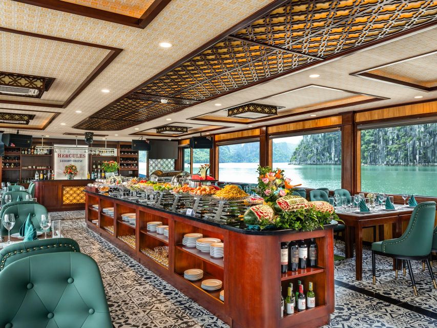 From Hanoi: Ha Long Bay 5-star Day Cruise with Buffet Lunch - Buffet lunch with limestone islands outside the window