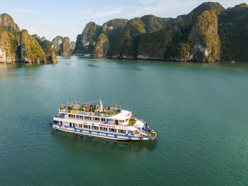 From Hanoi: Halong Bay Day Trip w/ Cave, Island & Kayak - Cruising Halong Bay between the limestone towers