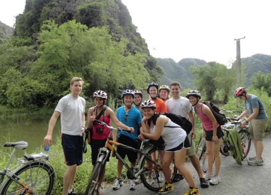 From Hanoi: Hoa Lu, Hang Mua Hike, Tam Coc Boat, and Lunch - Tam Coc by traditional sampan