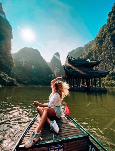 From Hanoi: Hoa Lu-Trang An-Mua Cave Luxury Trip w/Limousine - A short bicycle ride through village life