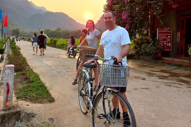 Full-Day Cycling & Handcraft Workshop in Mai Chau Valley - Cycling between rice fields and White Thai homes