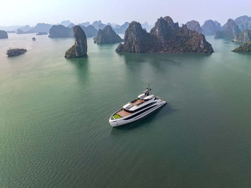 Full Day: Fabulous Halong Bay Tour with Taliya Cruise 5<em> – Key points to know before booking’ /></p>
<ul>
<li><strong>Dark and Bright Cave by bamboo boat:</strong> A local rower takes you through a calm cave route into a lagoon surrounded by limestone cliffs.</li>
<li><strong>Swimming is part of the plan:</strong> The Ao Ech stop gives you a chance to swim, something many Halong Bay cruises do not always permit.</li>
<li><strong>A full seven-hour cruise:</strong> You get more time on the water than on a quick sightseeing run, with lunch, activities, and sunset included.</li>
<li><strong>The $57 price covers the main costs:</strong> Lunch, entrance fees, guide, bamboo boat, kayaking, and return bus transport are included if you choose the transfer option.</li>
<li><strong>The road journey needs patience:</strong> The expressway makes the trip possible in one day, but the ride can still be tiring, especially for taller passengers.</li>
<li><strong>The cruise name may need checking:</strong> The experience is described as Taliya Cruise in the title, while the provider information names Doria Cruise and some comments refer to Rosa Cruise. Confirm the exact vessel before you pay.</li>
</ul>
<h2>A long day that reaches the quieter side of the bay</h2>
<p><img width="820" height="614" decoding="async" src=