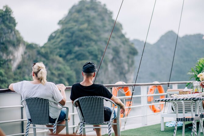 Full-Day Halong Bay Cruise with Limousine Pickup - Cruising past Thumb Rock and Dog Rock