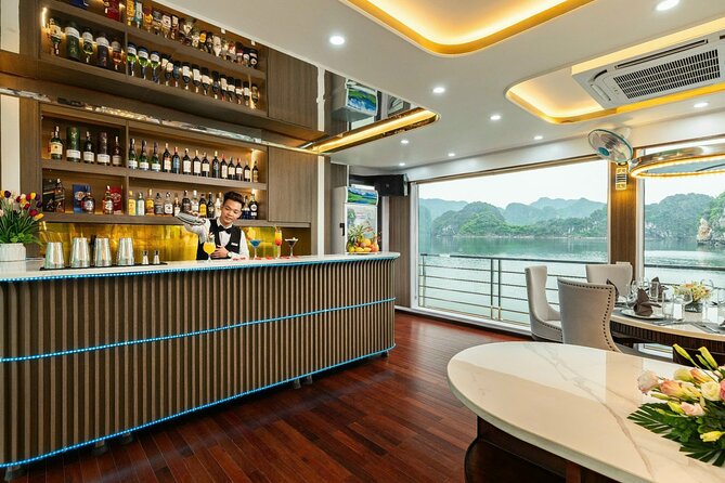 Full day Halong Bay Luxury Cruise - buffet lunch, kayak, swim. - Titop Island: swim, beach, or 500 steps