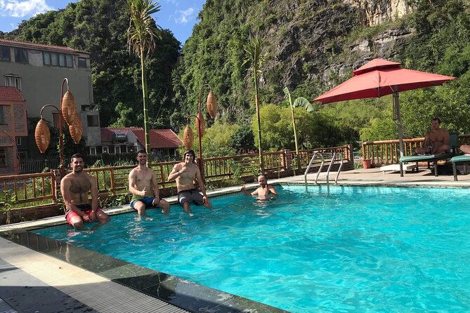 Full-Day Tour Hoa Lu, Tam Coc Boat Trip and Mua Cave - Mua Cave and the 500-step climb