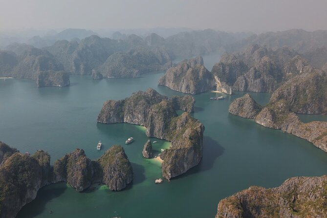 Ha Long Bay Cruise Day Tour - Cave, Kayaking, Swimming & Lunch - Ti Top Island for swimming or a climb