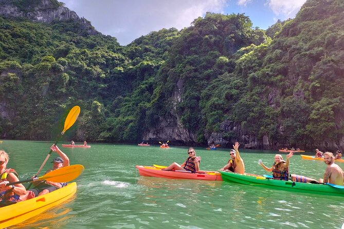 Ha Long Bay Cruise Day Tour - Cave, Kayaking, Swimming & Lunch - Boarding at Tuan Chau and settling into the boat