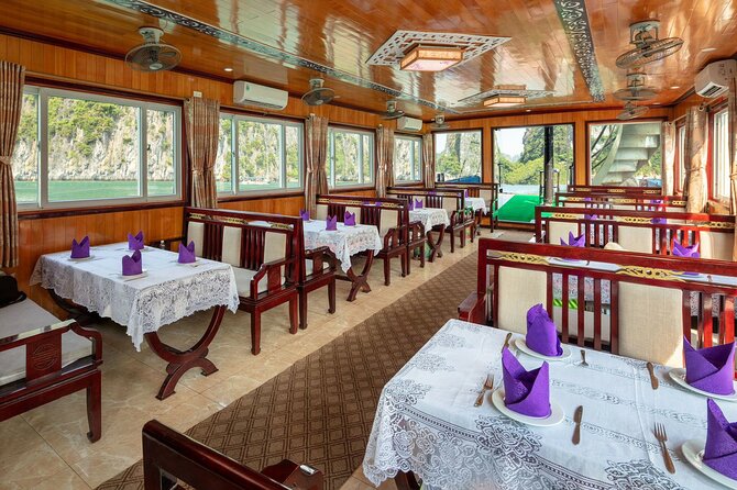 Ha Long Bay Cruise Day Tour with lunch, kayaking, surprise cave & titop island - Cruising among Ha Long Bay’s limestone islands