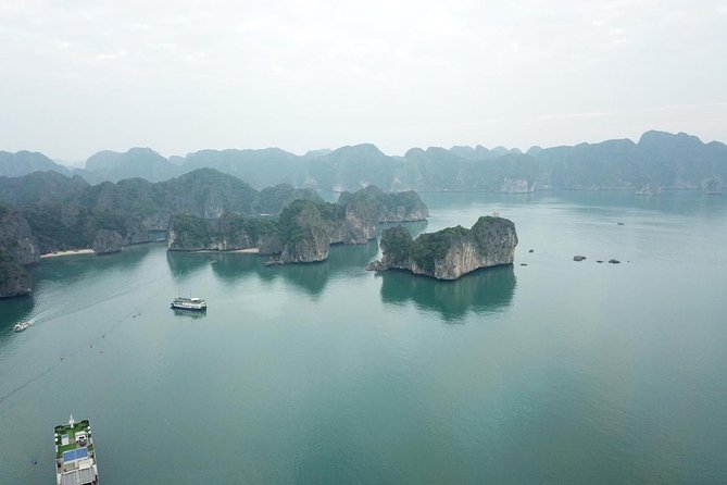 Ha Long Bay Six Hours Trip Kayaking & Swimming on Beach - Kayaking or bamboo boat through Luon Cave