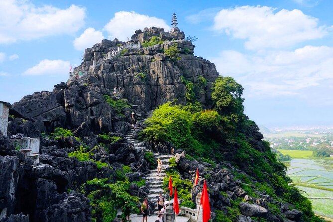 Ha Noi_Ninh Binh Tour Full Day_Mua Cave - Tam Coc - Hoa Lu - Leaving Hanoi for the limestone country
