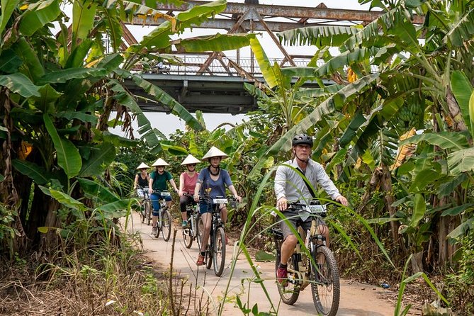 Half Day Ha Noi Tour by E-bike - Crossing the Long Bien Bridge