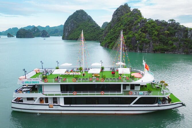 Halong Apollo 5<em> Cruise with Jacuzzi Day Trip And Buffet Lunch – Key points to know before booking’ /></p>
<ul>
<li><strong>A full classic Halong Bay route in one day:</strong> The schedule includes Luon Cave, Sung Sot Cave, and Ti Top Island.</li>
<li><strong>A new 2024 five-star boat:</strong> You get an air-conditioned cruise with a jacuzzi, buffet lunch, and sunset refreshments.</li>
<li><strong>A small maximum group:</strong> The tour is limited to 19 people, which should make instructions and transfers easier to manage.</li>
<li><strong>A long but practical Hanoi transfer:</strong> Hotel pickup takes about 45 minutes, followed by roughly 2.5 hours on the road each way.</li>
<li><strong>A guide can shape the whole day:</strong> Tommy is especially noted for fluent English, humor, photography help, and checking on solo participants.</li>
<li><strong>The price covers the big costs:</strong> At $60 per person, transport, entrance fees, lunch, guide service, and the cruise are included, but drinks at lunch cost extra.</li>
</ul>
<h2>Why this day cruise can replace an overnight trip</h2>
<p> Cruise with Jacuzzi Day Trip And Buffet Lunch – Why this day cruise can replace an overnight trip’ /></p>
<p><p>Most first visits to Halong Bay come with a choice: spend two days and one night on a boat, or accept a fast day trip from Hanoi. Apollo’s answer is to pack the main sights into roughly six hours on the water, with a morning road transfer and a return to Hanoi in the evening.</p>
</p>
<p><p>I see the appeal. At $60 per person, you are not paying only for a boat ride. The price includes an air-conditioned vehicle, English-speaking guide, entrance fees, buffet lunch, and the cruise itself. For a short stay in Hanoi, that makes the tour a useful way to reach Halong Bay without arranging separate transport or spending a night away from the city.</p>
</p>
<p><p>Still, the word <em>day trip</em> matters. You leave Hanoi after hotel pickups, ride to the coast, board the boat, visit several busy attractions, and then make the same road journey back. If you want quiet mornings on the water or time to sit on deck and watch the islands pass, an overnight cruise will suit you better. If your goal is to see the key places in one day, this plan is more efficient.</p>
</p>
<div class="twil" style="margin: 20px 0; padding: 15px 0;"><p>More Day Trips in Ha Long Bay</p><ul style="margin: 10px 0; padding-left: 0; list-style: none;"><li style="margin: 0 0 12px 0; padding: 0 0 12px 0; border-bottom: 1px solid #F4E1DF; line-height: 1.4;"><a href="https://lovinghanoi.com/private-tour-halong-bay-one-day-with-cave-kayaking-bamboo-boat/">PRIVATE TOUR HALONG BAY ONE DAY with Cave, Kayaking, Bamboo Boat</a><br><span style="font-size: 0.82em; color: #7A4A42;"><span style="color: #14CBC4;">★</span> 5.0 &nbsp;&middot;&nbsp; 1,007 reviews</span></li><li style="margin: 0 0 12px 0; padding: 0 0 12px 0; border-bottom: 1px solid #F4E1DF; line-height: 1.4;"><a href="https://lovinghanoi.com/best-halong-5-star-day-trip-inclusivebuffetcavekayaktransfer/">Best Halong 5 star Day Trip, inclusive,buffet,cave,kayak,transfer</a><br><span style="font-size: 0.82em; color: #7A4A42;"><span style="color: #14CBC4;">★</span> 5.0 &nbsp;&middot;&nbsp; 933 reviews</span></li><li style="margin: 0; padding: 0; border-bottom: none; line-height: 1.4;"><a href="https://lovinghanoi.com/hanoi-ha-long-bay-day-trip-luxury-cruise-buffet-lunch/">Hanoi: Ha Long Bay Day Trip – Luxury Cruise & Buffet Lunch</a><br><span style="font-size: 0.82em; color: #7A4A42;"><span style="color: #14CBC4;">★</span> 4.9 &nbsp;&middot;&nbsp; 673 reviews</span></li></ul></div><h2>From Hanoi to Tuan Chau Island</h2>
<p><img width="669" height="446" decoding="async" src=