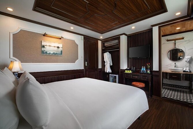 Halong Bay 2 Day Cruise Including Transfer from Hanoi - Day one: cave, island, kayak, and sunset