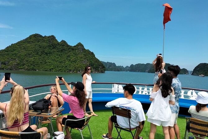 Halong Bay Day Tour With Titop Island, Cave, Kayak & Lunch - Sunset snacks and the ride back to Hanoi