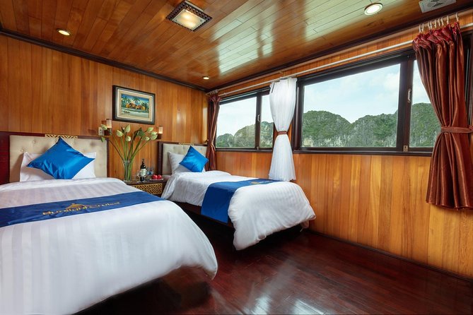 Halong bay deluxe cruise 2 days/ 1 night: kayaking, titop island, surprise cave - Morning pickup from Hanoi or noon arrival at the harbor