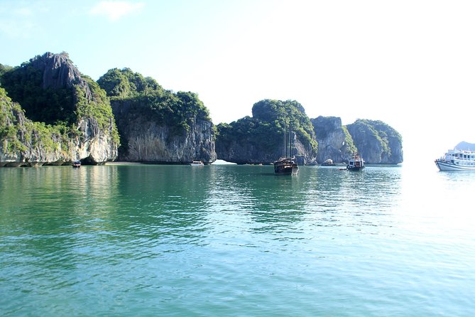 Halong bay full day trip from Hanoi: Visiting Thien Cung, Dau Go cave & Kayaking - Seafood lunch served on the boat