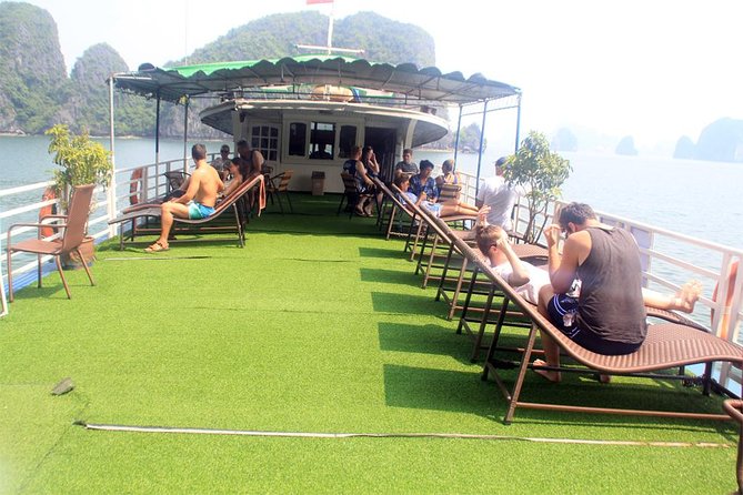 Halong bay full day trip: Visit Surprise cave, Titop island, kayaking & swimming - Guide service and the size of the group