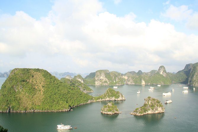 Halong bay full day trip: Visit Surprise cave, Titop island, kayaking & swimming - Surprise Cave, 45 minutes of stairs and rock formations