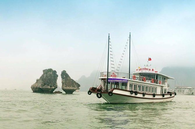 Halong Bay Islands and Caves: Full-Day Tour from Hanoi - Kayaking for 40 minutes among the limestone towers
