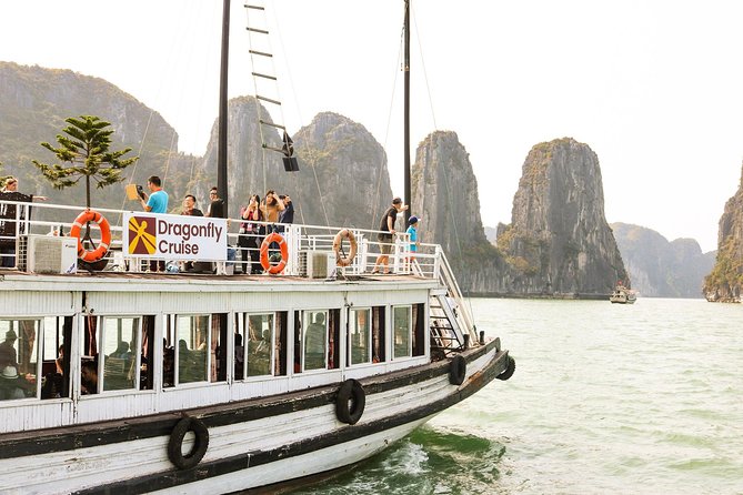 Halong Day Tour: Islands, Cave, Kayak. Lunch. Transfers - The long road from Hanoi to Ha Long Bay