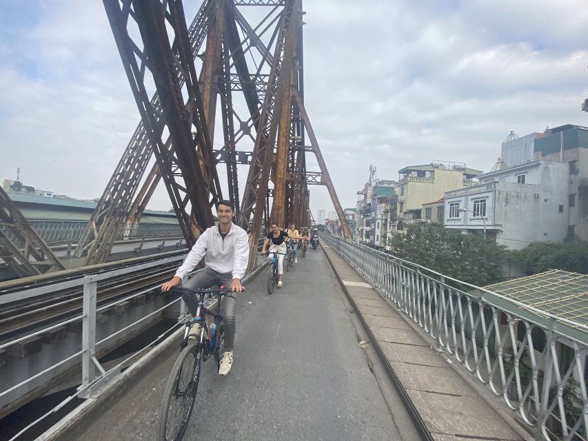 Hanoi: Bike Tour Through Hidden Gems and Banana Island - Crossing Long Bien Bridge toward Banana Island