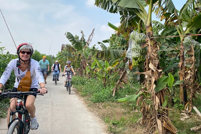 Hanoi City Bike Tour through Banana Island & Food Tasting - Crossing Long Bien Bridge after 100 years