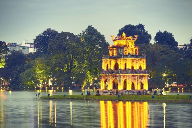 Hanoi City Motorbike Tour with Banana Island and Local Food - Hanoi Opera House begins the ride with old-world style