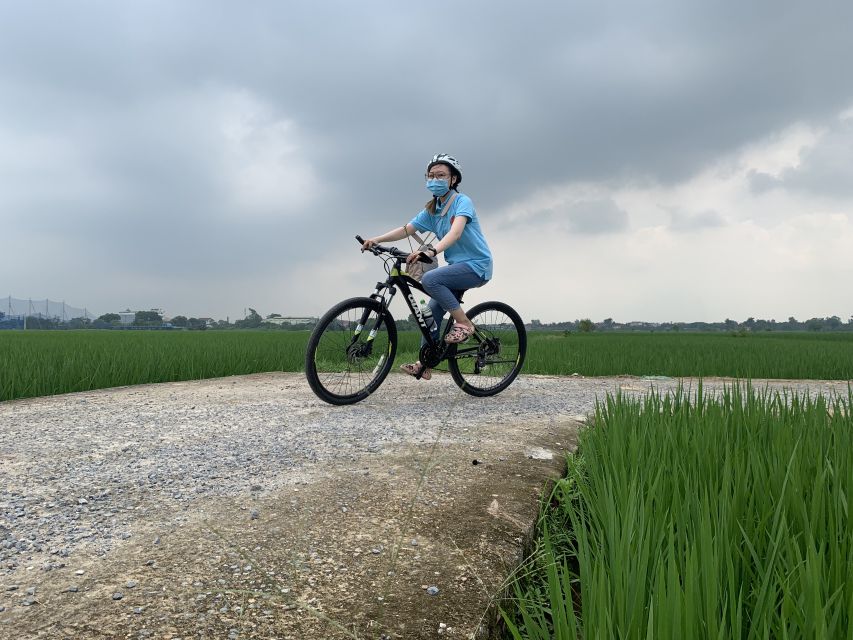 Hanoi Countryside Bike Tour: Red River Culture & Daily Life - Long Bien Bridge or a small boat