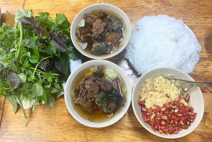 Hanoi: Guided Street Food Tour with Train Street Experience - Four to six dishes that introduce Hanoi one bite at a time