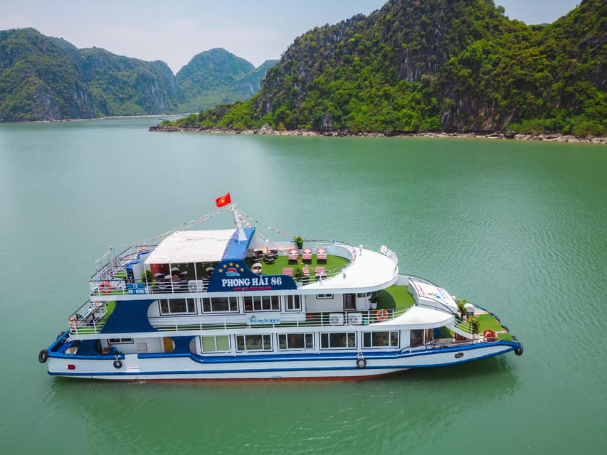 Hanoi: Ha Long Bay Day Cruise by Ha Long Excursion Deluxe - Boarding the cruise and seeing Ha Long Bay at lunch