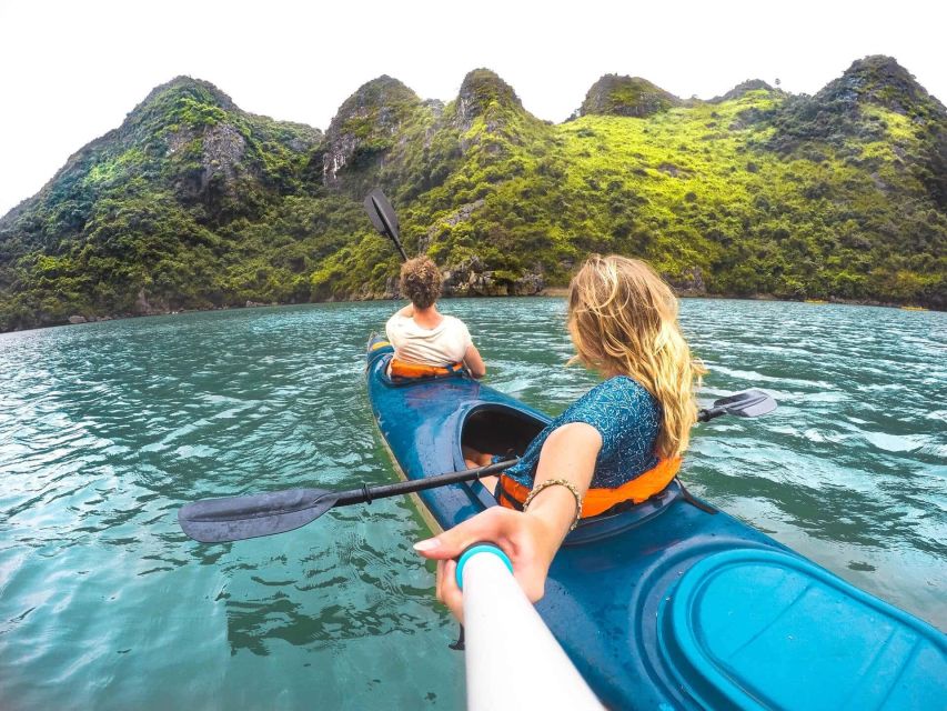 Hanoi: Halong Bay Day Trip with Titop Island, Cave, & Kayak - Sung Sot Cave and its dramatic formations