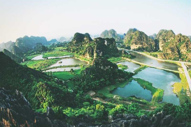 Hanoi - Hoa Lu - Tam Coc - Mua Cave - 1 Day Tour. By Luxury Limousine From Hanoi - The Tam Coc boat ride and its three caves