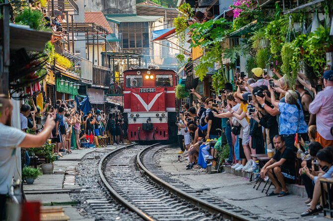 Hanoi Jeep By Night Street Food Tour and Train Street Experience - Bun Cha and family cooking traditions