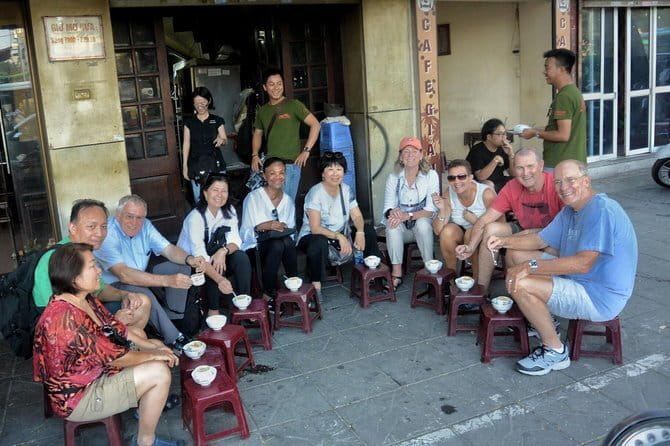 Hanoi Michelin Star Food Tour Via Jeep, Vespa or Motorbike - Hanoi Train Street with coffee and a close view